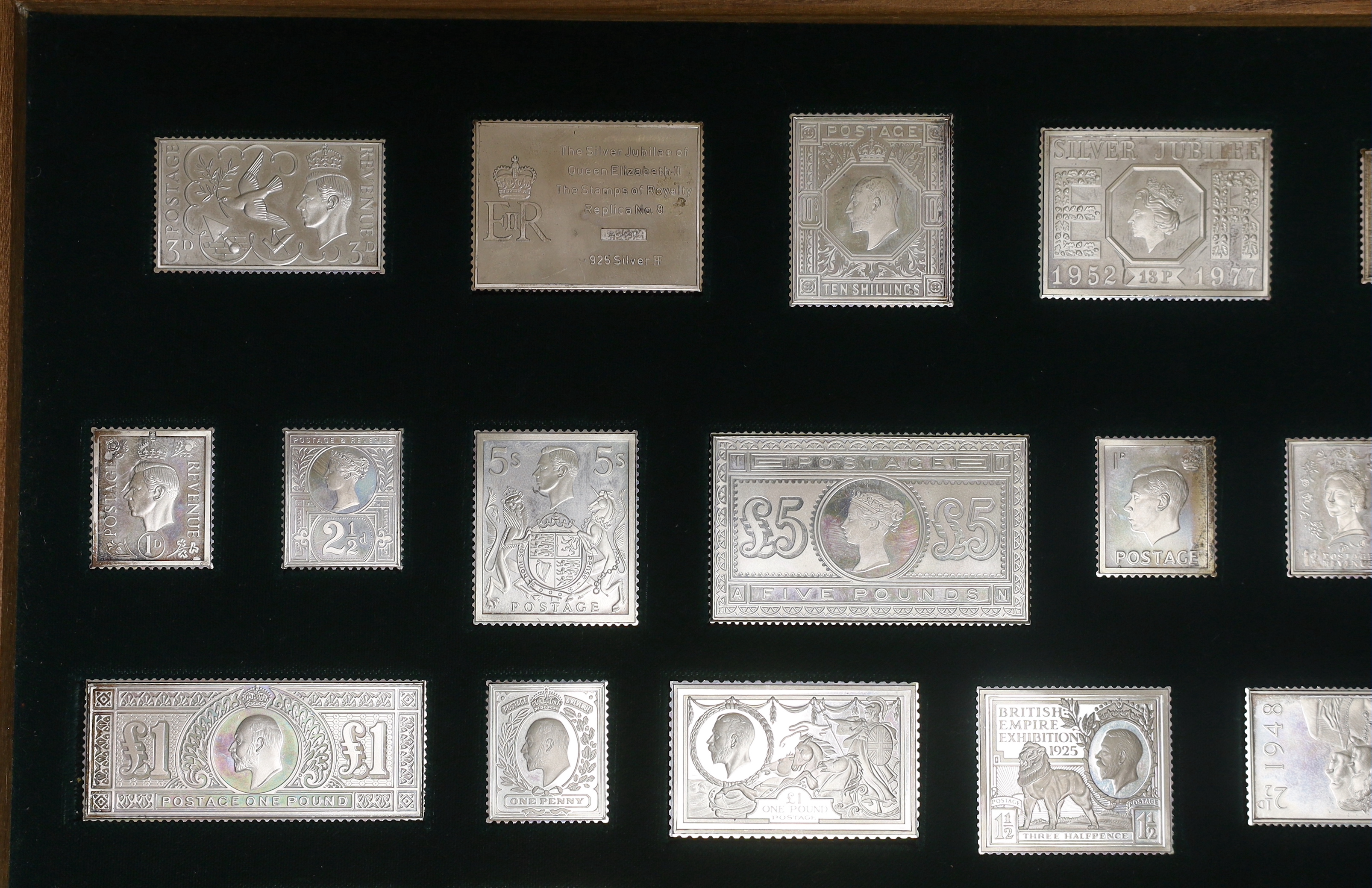 A cased modern set of twenty five silver 'Stamps of Royalty' replicas, with paperwork